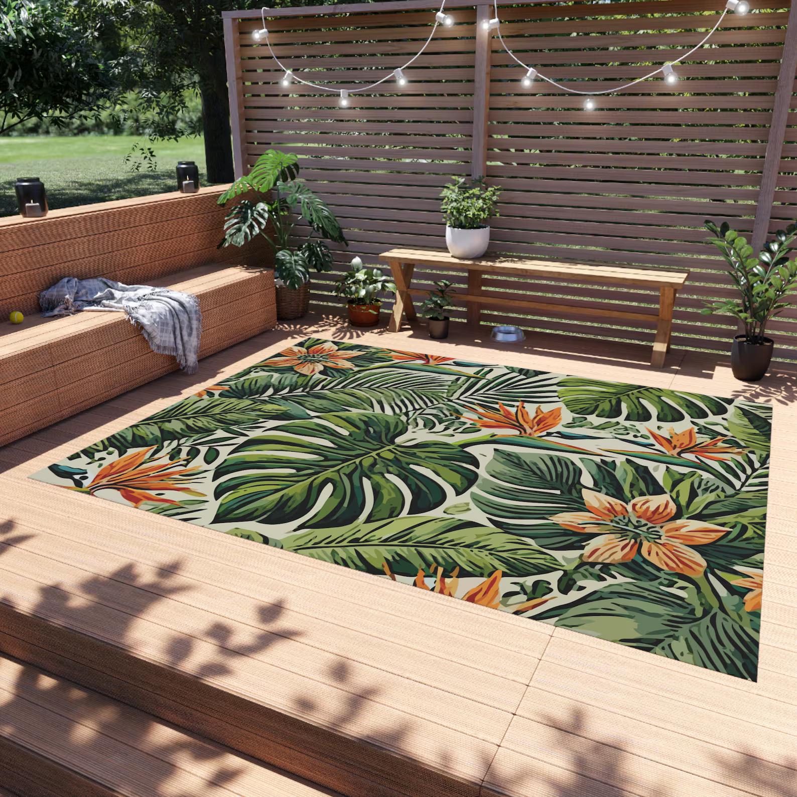 Tropical Green Foliage and Orange Flowers Outdoor Rug. Featuring lush green leaves and foliage with vibrant orange tropical flowers. 5 sizes